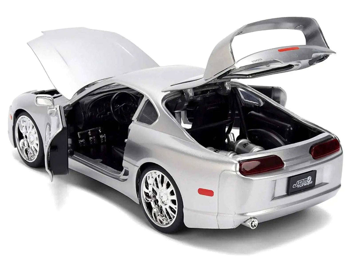 1995 Toyota Supra Silver Metallic "JDM Tuners" Series 1/24 Diecast Model Car by Jada Cartsfy Inc.