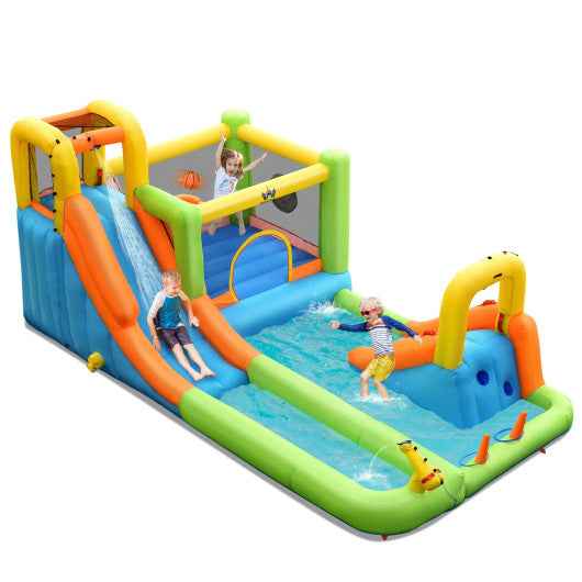 Inflatable water slide park with dual orange slides and blue bounce area, green and yellow frame