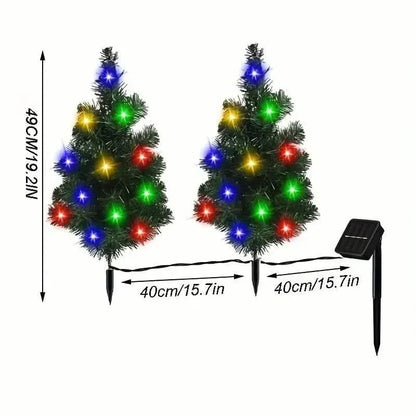 Two miniature Christmas tree lawn lights with solar panel and ground stakes