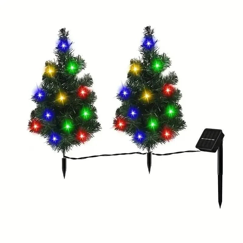 Pair of miniature Christmas tree lawn lights with colorful LED bulbs and ground stakes