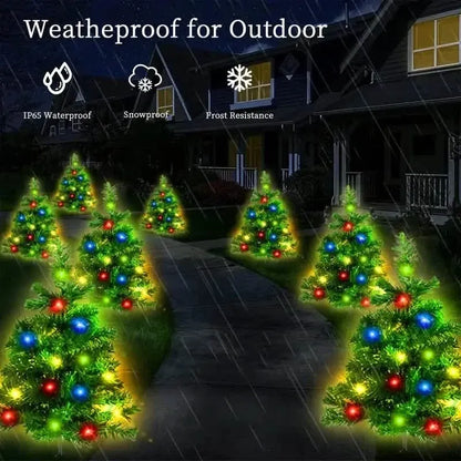 Miniature Christmas tree lawn lights with multicolor LED bulbs displayed outdoors