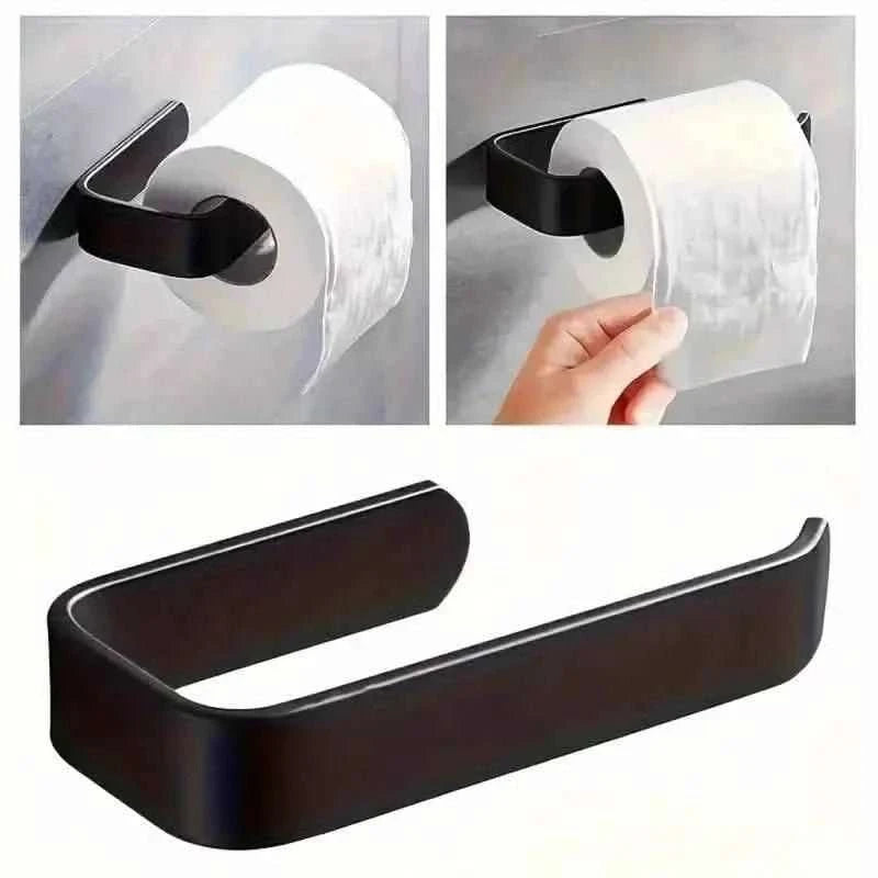 Black curved toilet paper holder holding a toilet paper roll.