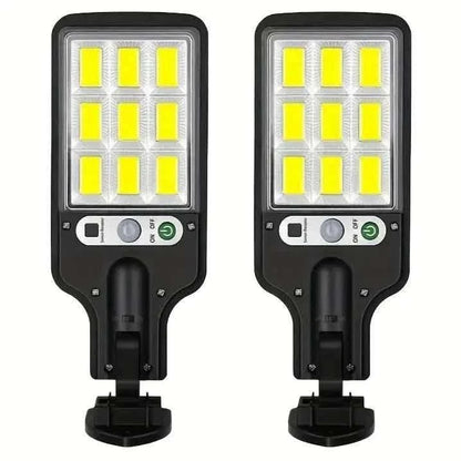Solar street light, black housing with square LED array and motion sensor controls
