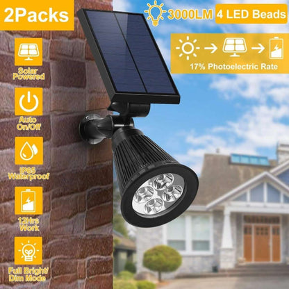 Solar outdoor spotlight with round LED array and solar panel, black wall-mount style
