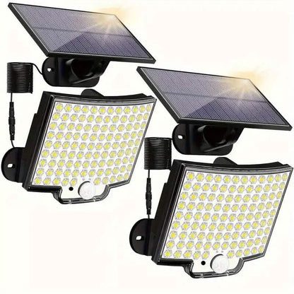 Solar LED outdoor light set with two wall-mounted fixtures and solar panels