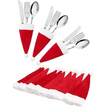 Red Santa hat utensil holders on forks and spoons, plus a folded holder