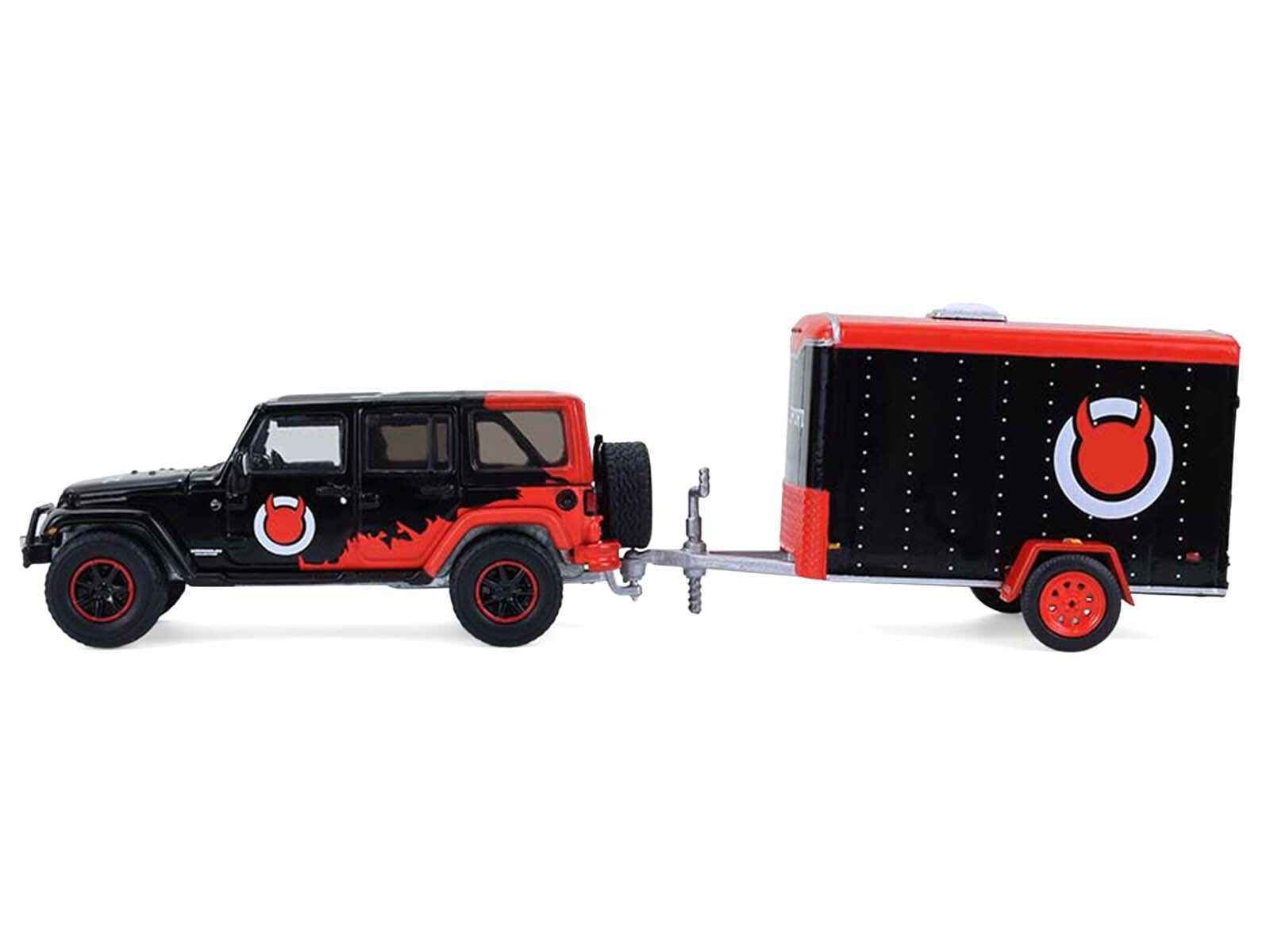Black diecast Jeep Wrangler with red graphics and small cargo trailer, red wheels
