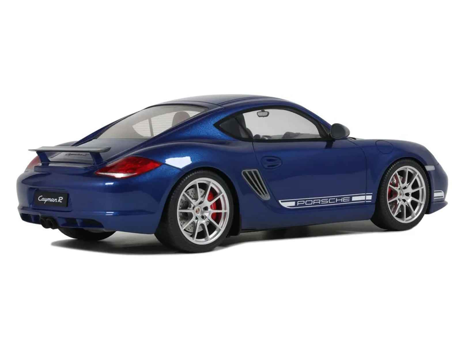 Blue Porsche Cayman R 1/18 model car, rear three-quarter view with red taillights