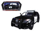 Black and white CHP police utility interceptor diecast model car with push bar