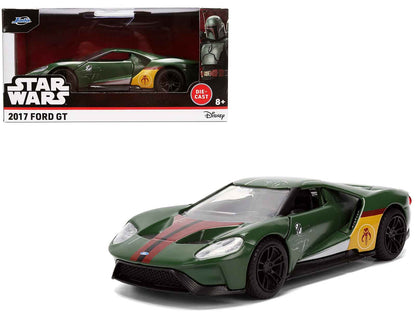 Dark green diecast Ford GT model car with racing stripes, yellow emblem, black wheels