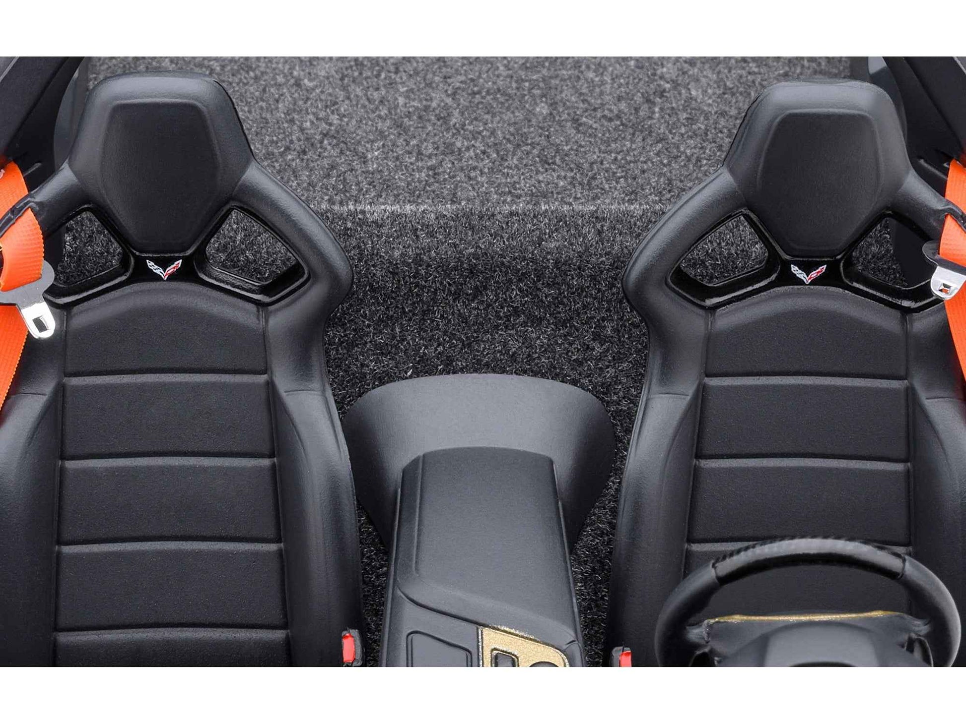 Black leather car seats with headrests and center console