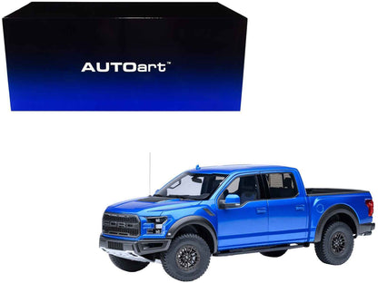 Autoart 1/18 blue Ford F-150 Raptor model pickup truck, front 3/4 view