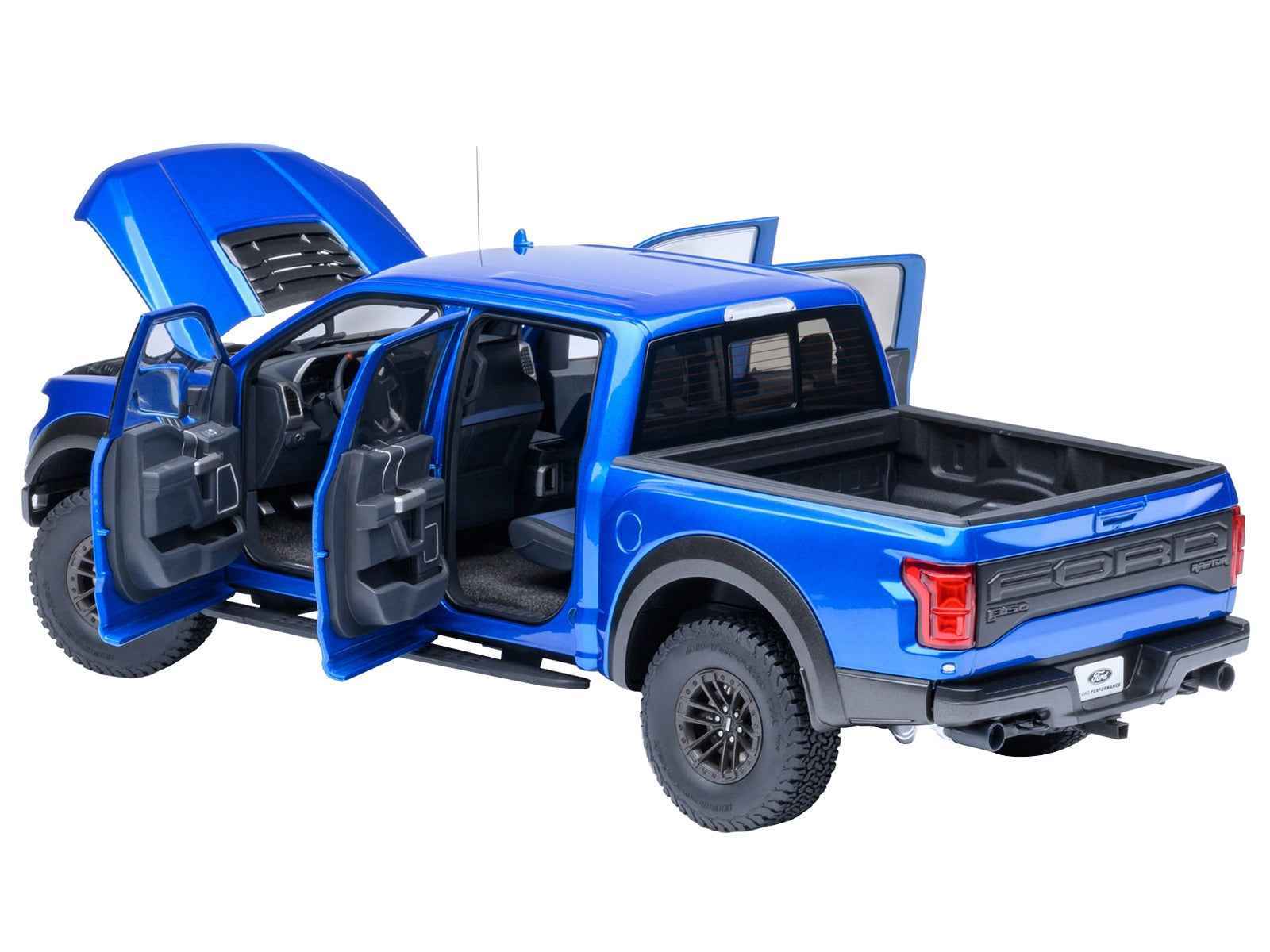 Autoart 1/18 blue Ford F-150 Raptor model truck with doors open, interior visible