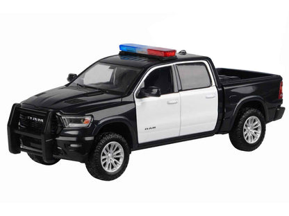 Black and white 1:27 scale diecast pickup truck with flashing roof light bar
