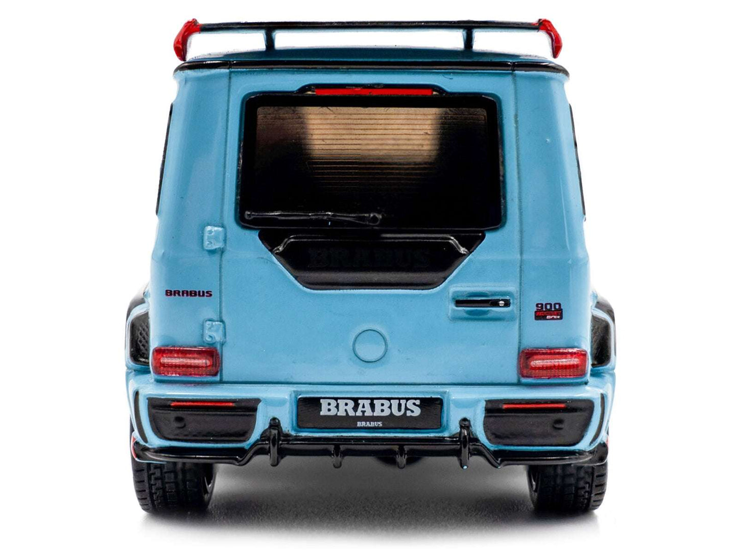 Rear view of light blue diecast SUV model car with Brabus plate and dual exhaust