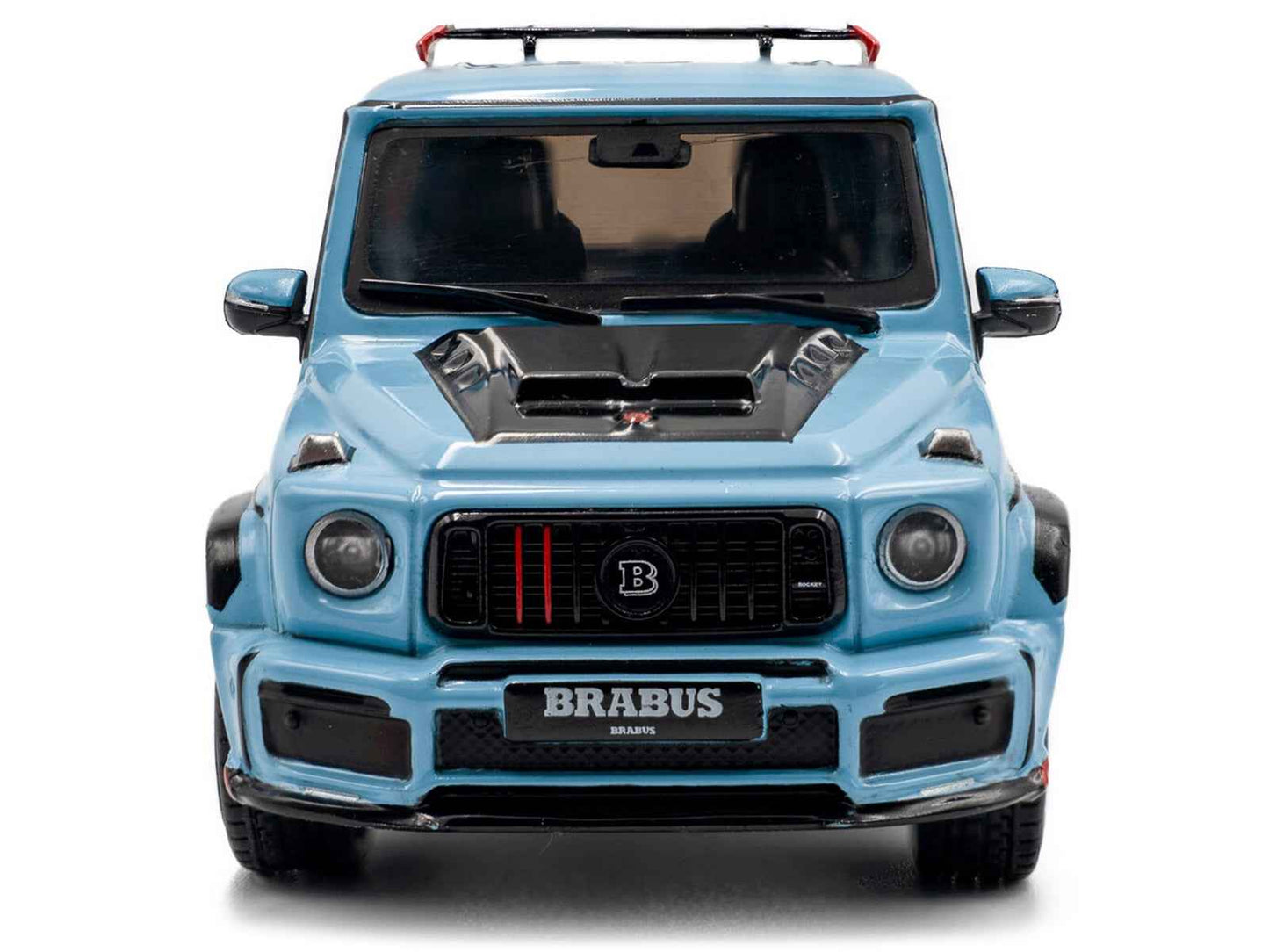 Front view of light blue diecast SUV model car with Brabus grille and round headlights