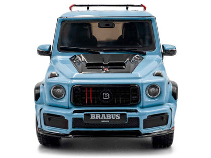 Front view of light blue diecast SUV model car with Brabus grille and round headlights