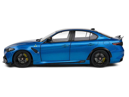 1/18 blue metallic diecast model car with carbon-look roof, black wheels