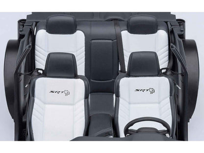 SRT logo black-and-white sports seats with headrests
