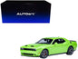 Autoart 1/18 scale green muscle car model with front grille, hood vents, and headlights