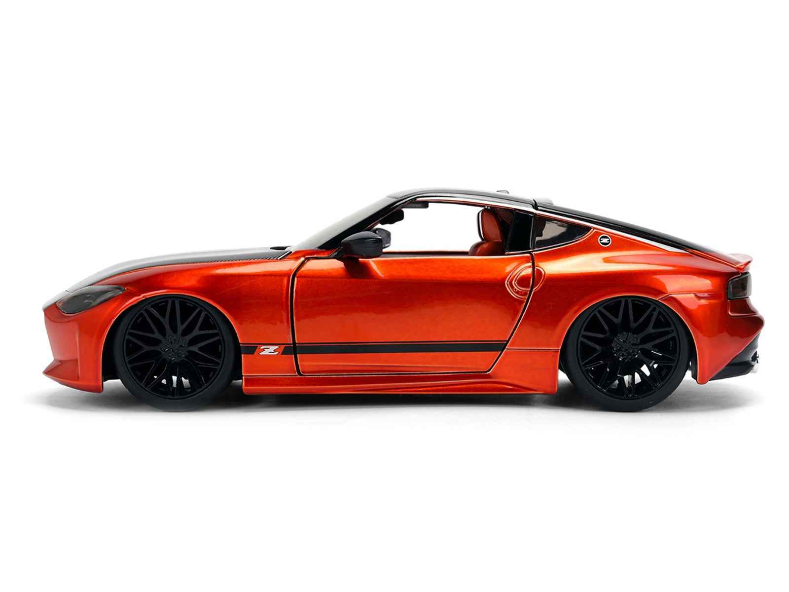 2023 Nissan Z Orange Metallic with Carbon Hood and Black Top "JDM Tuners" Series 1/24 Diecast Model Car by Jada Miniature Motors Default Title Default Title-