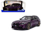 Purple BMW M3 Competition touring diecast model car with black top, front view