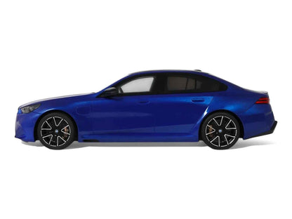 Blue BMW M5 1/18 model car side profile with black wheels