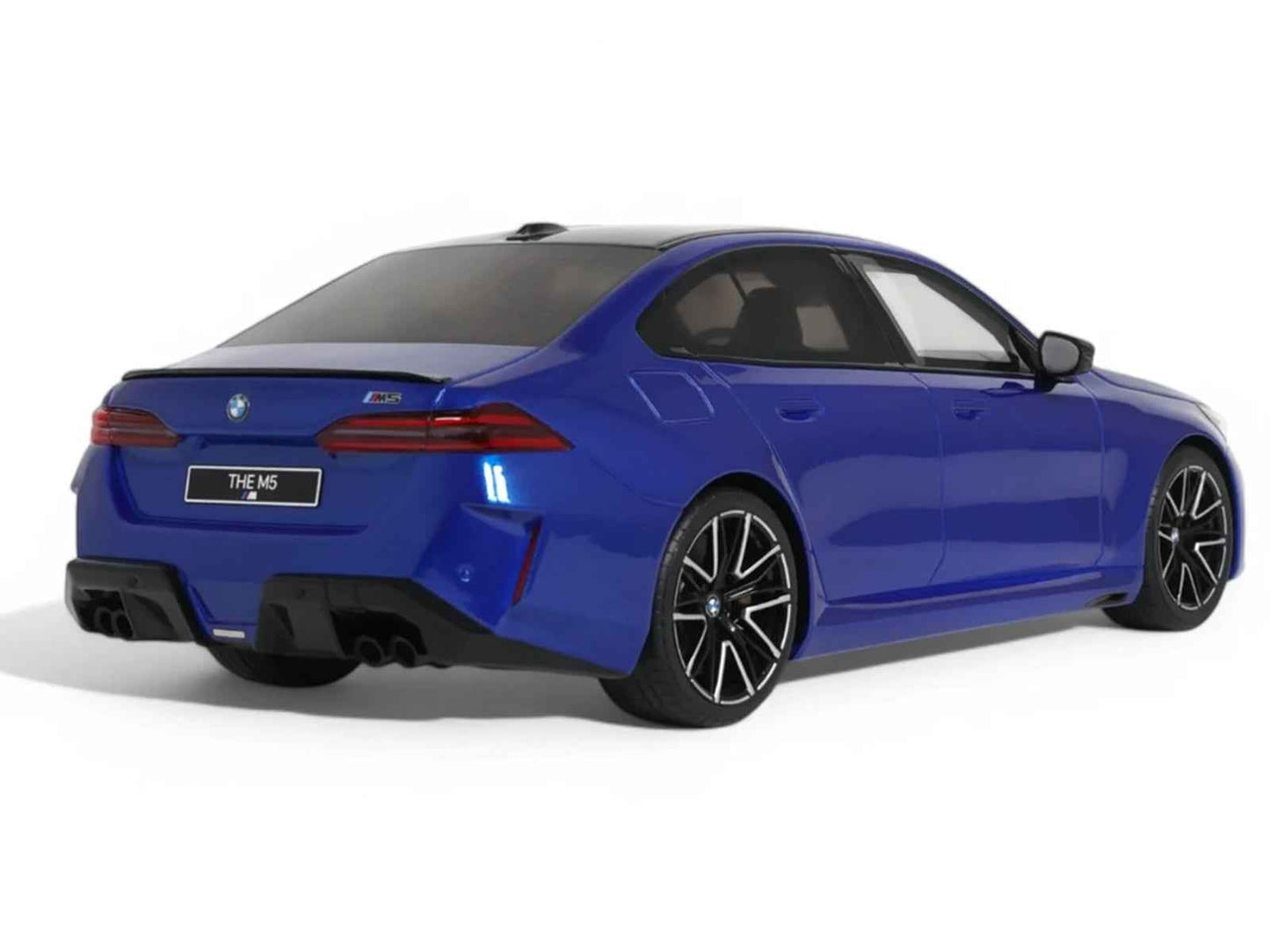 Blue BMW M5 1/18 model car rear 3/4 view with black accents