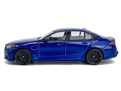Diecast BMW M5 sedan model car in marina blue with black roof, side profile.