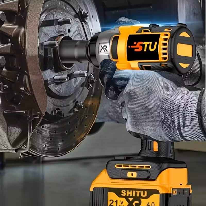 Yellow cordless impact wrench drill driving a socket into a car wheel