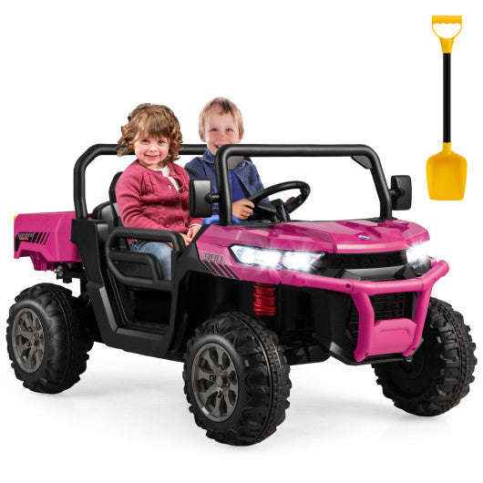 Pink ride-on kids electric car with dump bed, headlights, and two seats