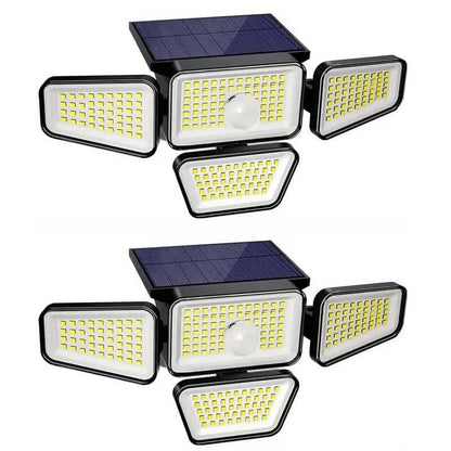 Set of two solar LED garden lights, each with four lamp heads and top solar panel