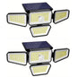 Set of two solar LED garden lights, each with four lamp heads and top solar panel
