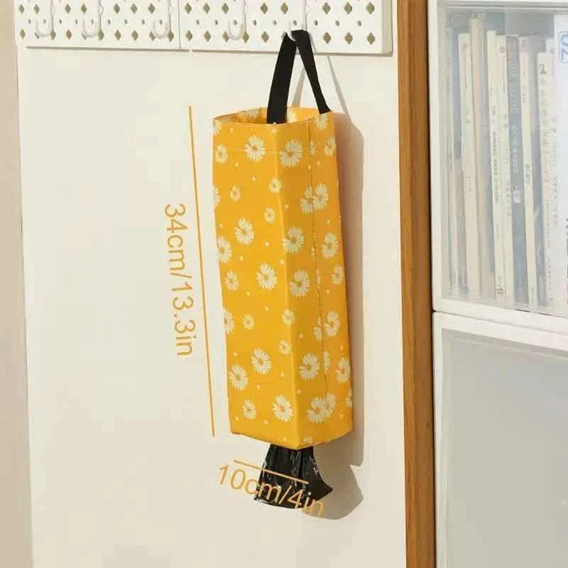 Yellow daisy-print hanging trash storage bag with measurements on product