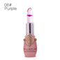 Color-changing flower lip gloss in purple, clear cap with flower-tip and gold-tone base