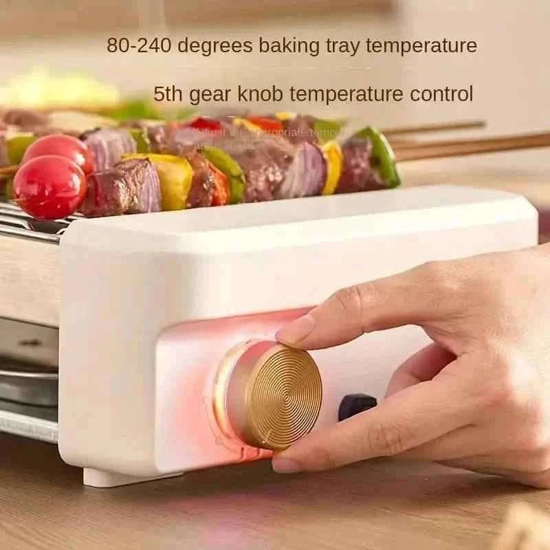 White sausage grill with temperature control knob being turned by a hand