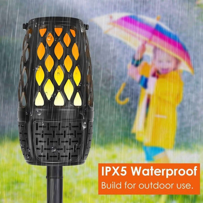 Black outdoor speaker lantern with yellow glowing panels and water-resistant design