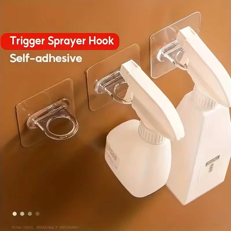 Self-adhesive spray hook with clear mounting plate and chrome trigger-style loop