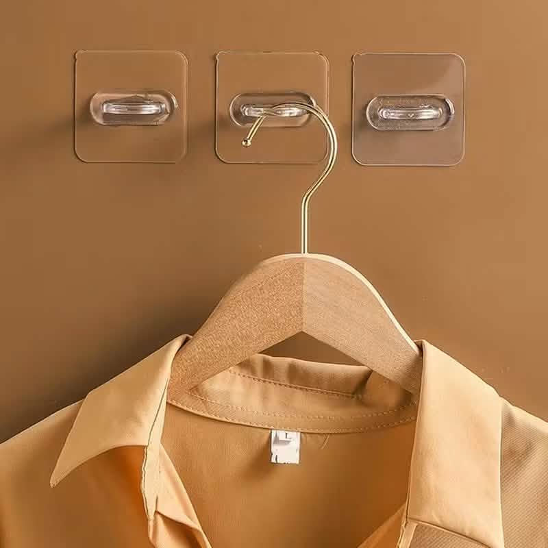Clear adhesive wall hook with chrome loop for hanging light tools or accessories