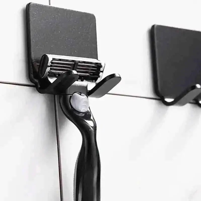 Wall-mounted razor holder with black mount and adjustable blade guard