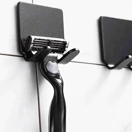 Wall-mounted razor holder with black mount and adjustable blade guard