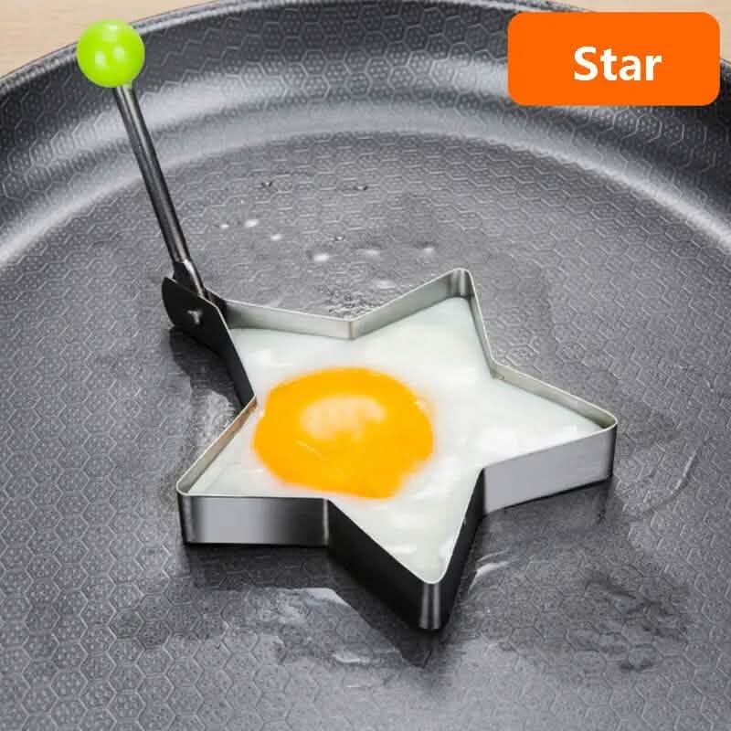 Star-shaped egg ring mold with handle, holding a sunny-side egg