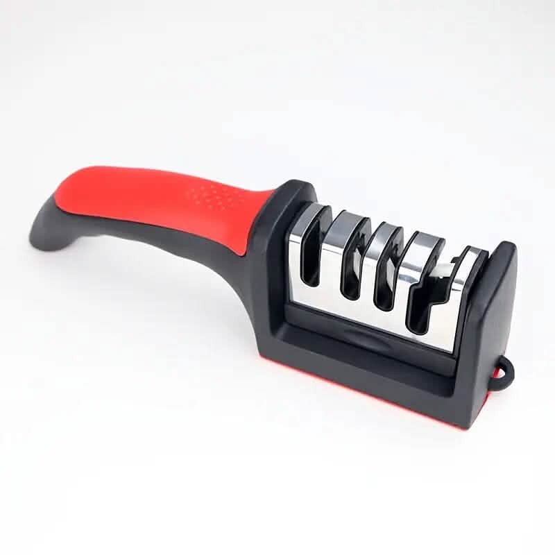 Red-and-black kitchen knife sharpener tool with multi-slot grinding head on stand