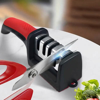 Red-and-black 4-stage kitchen knife sharpener with angled blade guide and sharpening slots