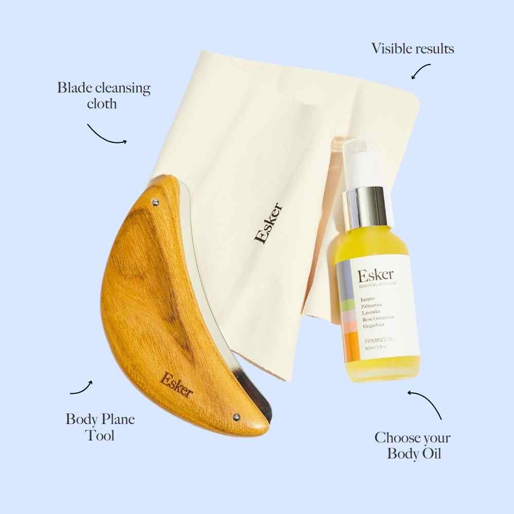Exfoliation tool with wooden blade, cleansing cloth, and body oil bottle