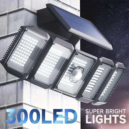 Solar motion sensor wall light with five LED heads in an angled layout