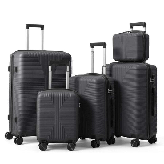Gray hard-shell spinner luggage set with telescoping handles, 5 suitcase sizes