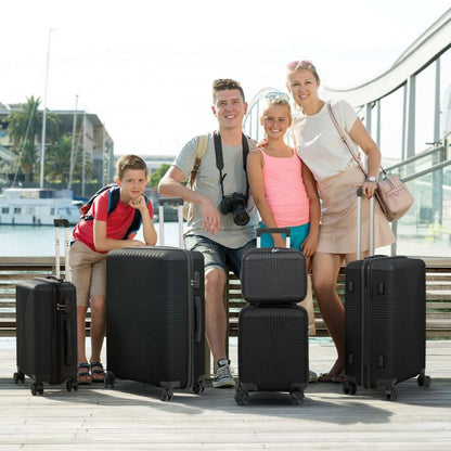Dark rolling luggage set with telescoping handles and four-wheel small and large suitcases