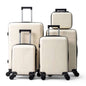 White hard-shell spinner luggage set with telescoping handles, 5 suitcase sizes