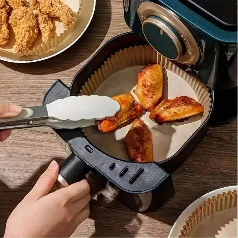 Disposable paper air fryer liner being placed into a basket, ribbed edges